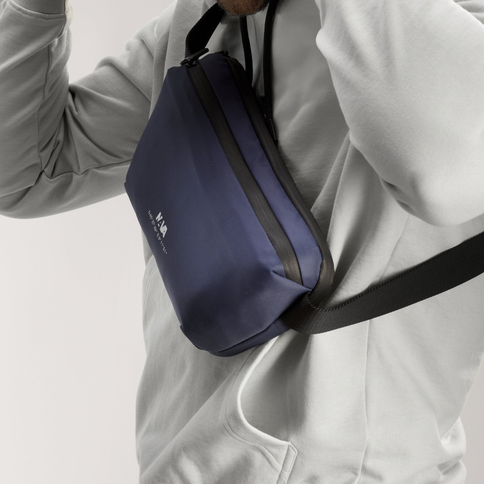 EXPLORER SLING BAG WITH FRONT POCKET AND BACK SECURITY POCKET ATLANTIC BLUE